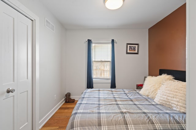 10637 Portage Rd, Portage, MI 49002 - bedroom featuring wood finished floors and baseboards
