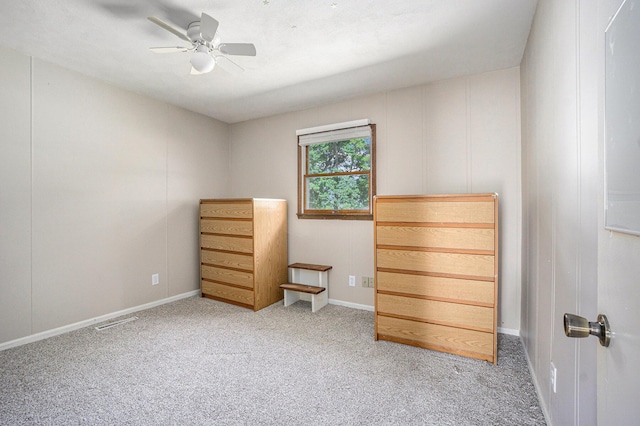 15645 Rich Ln, Hickory Corners, MI 49060 - unfurnished bedroom featuring carpet and a ceiling fan