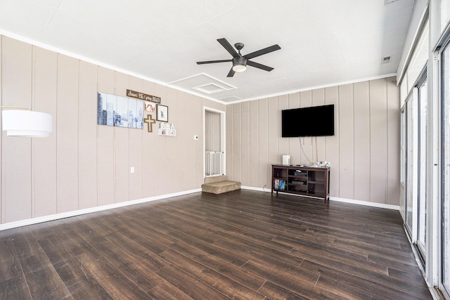 15645 Rich Ln, Hickory Corners, MI 49060 - unfurnished living room featuring dark wood-type flooring and a ceiling fan