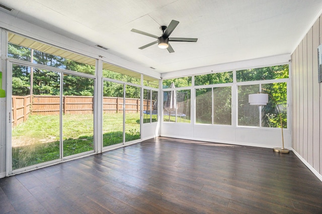 15645 Rich Ln, Hickory Corners, MI 49060 - unfurnished sunroom featuring a ceiling fan and plenty of natural light