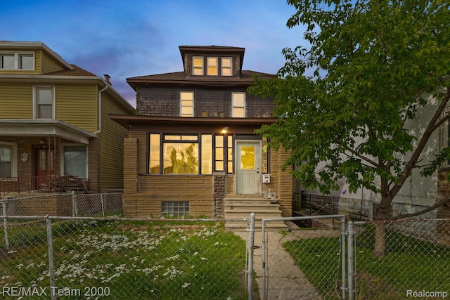 22 W Henry St, River Rouge, MI 48218 - traditional style home featuring a fenced front yard and a gate