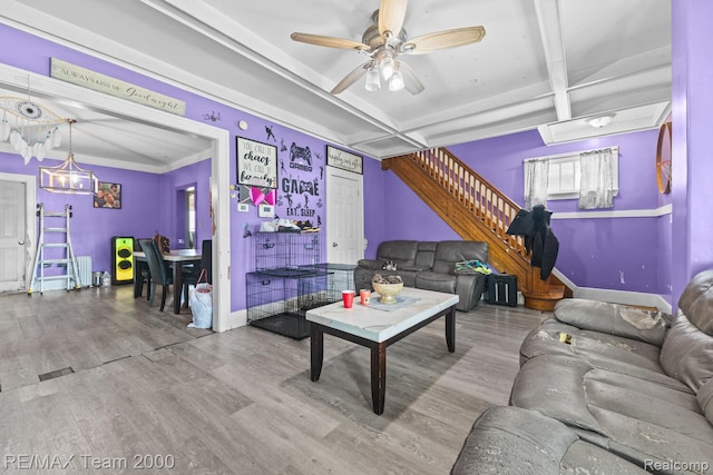 22 W Henry St, River Rouge, MI 48218 - living room with stairs, wood finished floors, ceiling fan, and beamed ceiling