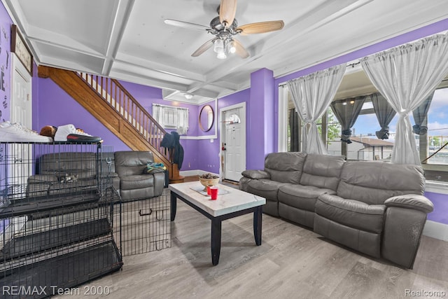 22 W Henry St, River Rouge, MI 48218 - living room with coffered ceiling, wood finished floors, ceiling fan, stairs, and beam ceiling