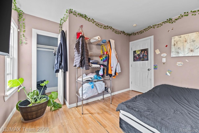 22 W Henry St, River Rouge, MI 48218 - bedroom featuring light wood finished floors and baseboards