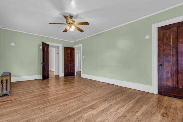 1227 Longfellow St, Detroit, MI 48202 - unfurnished room featuring a ceiling fan, light wood finished floors, and crown molding