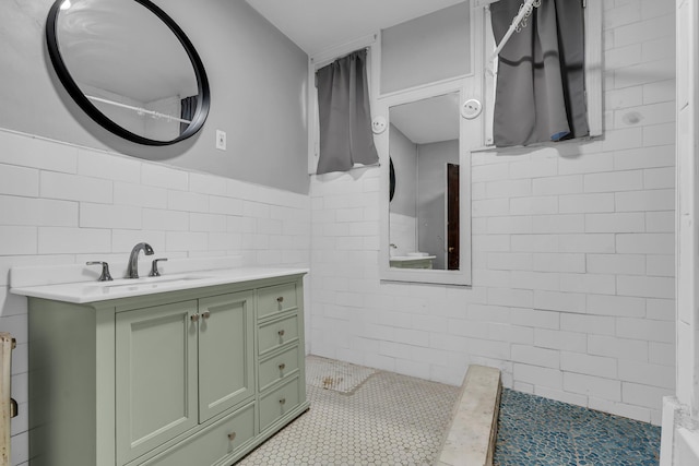 1227 Longfellow St, Detroit, MI 48202 - full bath with tile walls, vanity, wainscoting, and tile patterned flooring
