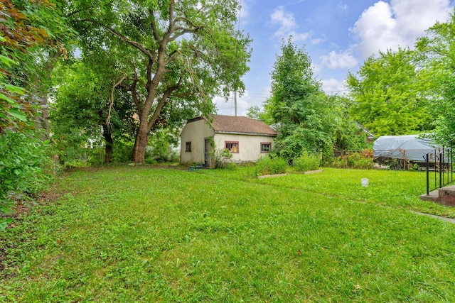 1227 Longfellow St, Detroit, MI 48202 - view of grassy yard featuring an outbuilding