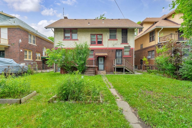 1227 Longfellow St, Detroit, MI 48202 - back of property with a garden and stucco siding
