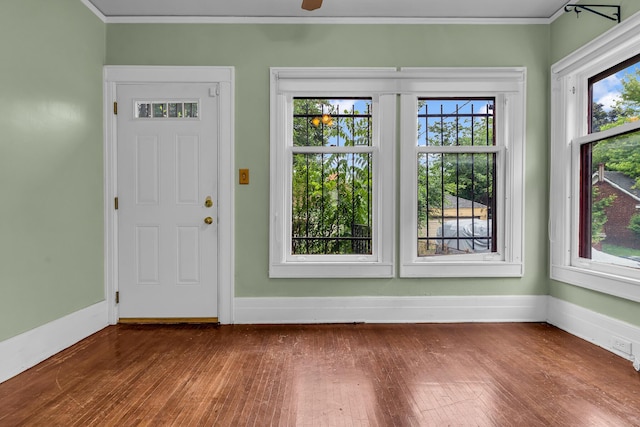 1227 Longfellow St, Detroit, MI 48202 - entryway featuring dark wood-style flooring, ornamental molding, and healthy amount of natural light