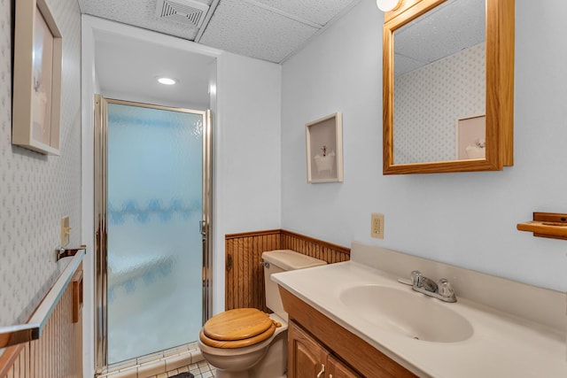 263 Westshore Dr, Jerome, MI 49249 - bathroom featuring wainscoting, a stall shower, vanity, and a paneled ceiling