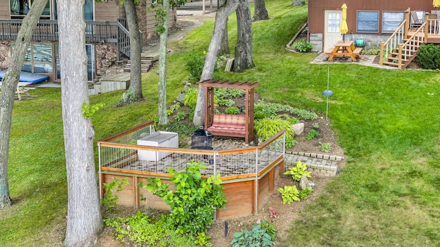 263 Westshore Dr, Jerome, MI 49249 - view of green lawn with stairs and a wooden deck