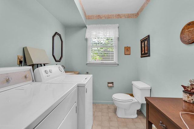 263 Westshore Dr, Jerome, MI 49249 - bathroom featuring washer and dryer, vanity, and tile patterned flooring