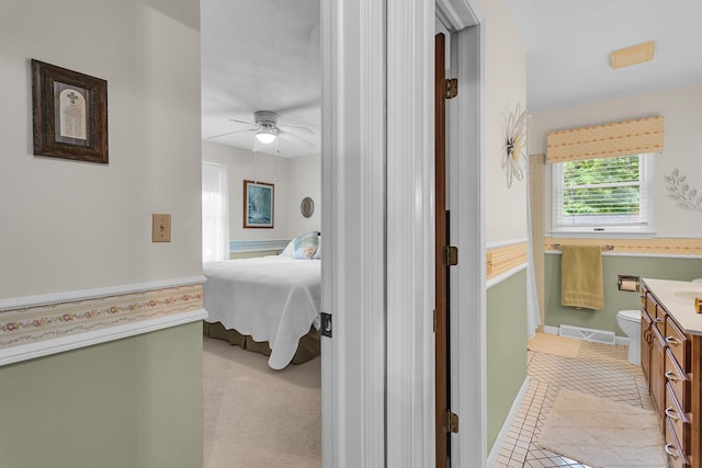 263 Westshore Dr, Jerome, MI 49249 - bedroom with baseboards and ceiling fan