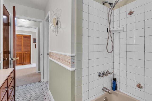 263 Westshore Dr, Jerome, MI 49249 - bathroom featuring shower / washtub combination, vanity, and tile patterned flooring