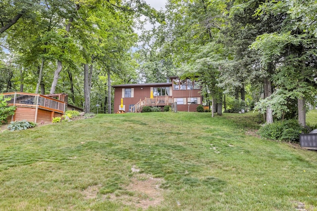 263 Westshore Dr, Jerome, MI 49249 - view of green lawn with a deck