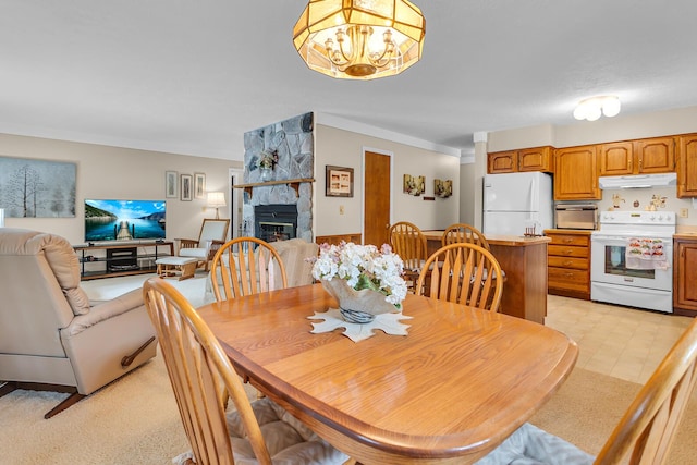 263 Westshore Dr, Jerome, MI 49249 - dining space featuring a fireplace