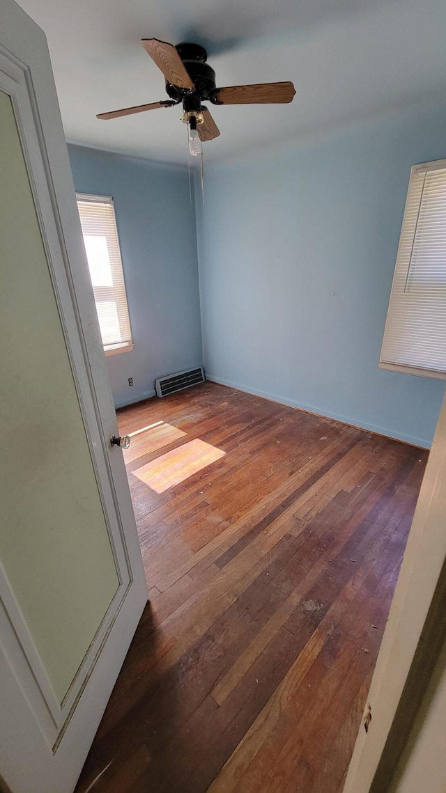 1109 Meadowbrooke St, Inkster, MI 48141 - spare room featuring wood-type flooring and a ceiling fan