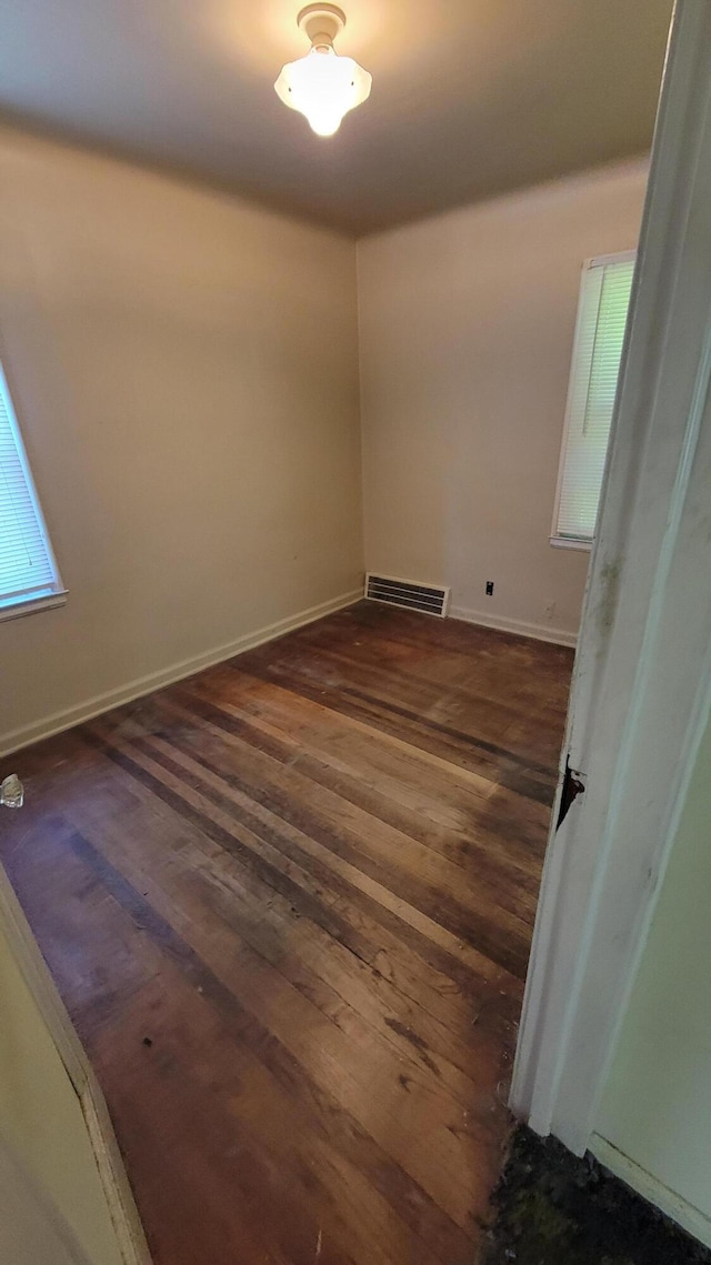 1109 Meadowbrooke St, Inkster, MI 48141 - empty room with dark wood-type flooring and baseboards