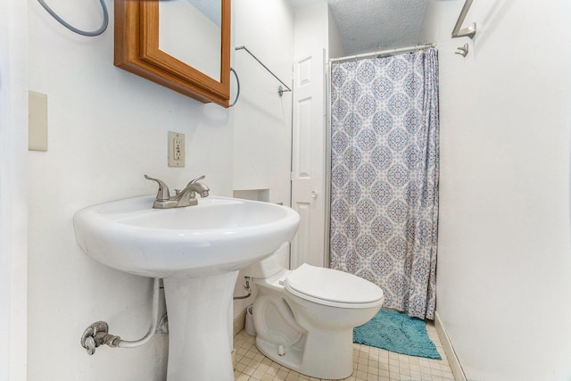 617 E Thorn St, Hastings, MI 49058 - bathroom with a shower with shower curtain and tile patterned flooring