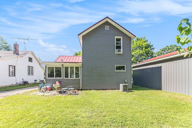 617 E Thorn St, Hastings, MI 49058 - rear view of property featuring a yard and a metal roof