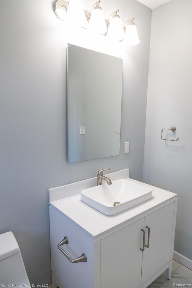 3926 Three Mile Dr, Detroit, MI 48224 - bathroom with vanity and marble look tiles