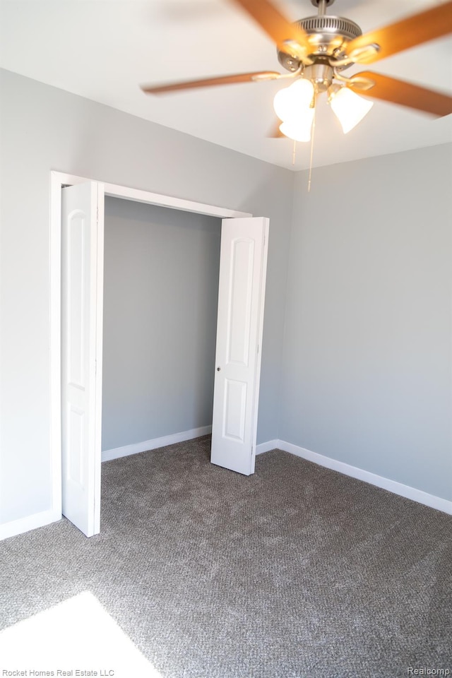 3926 Three Mile Dr, Detroit, MI 48224 - unfurnished bedroom featuring dark carpet, ceiling fan, and a closet