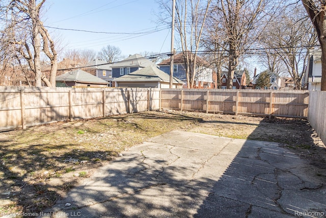 3926 Three Mile Dr, Detroit, MI 48224 - fenced backyard featuring a residential view and a patio