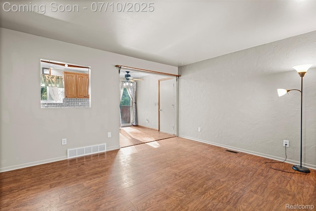 1560 Mercedes St, West Bloomfield, MI 48324 - spare room featuring wood finished floors and ceiling fan