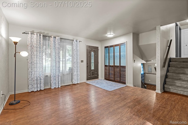 1560 Mercedes St, West Bloomfield, MI 48324 - foyer entrance with wood finished floors and stairs