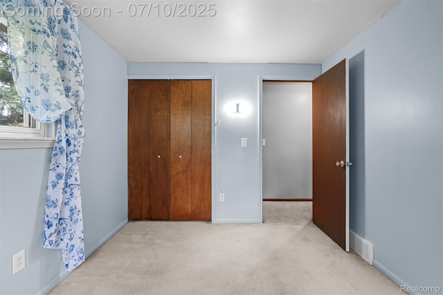 1560 Mercedes St, West Bloomfield, MI 48324 - unfurnished bedroom featuring carpet flooring and a closet