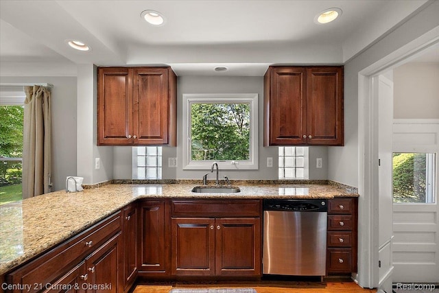 4151 Seminole Dr, Royal Oak, MI 48073 - kitchen with stainless steel dishwasher, light stone countertops, and recessed lighting