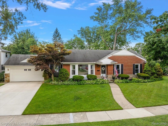 4151 Seminole Dr, Royal Oak, MI 48073 - view of front of house featuring brick siding, a front yard, an attached garage, and concrete driveway
