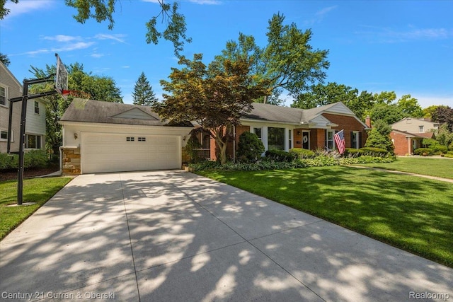4151 Seminole Dr, Royal Oak, MI 48073 - view of front facade featuring a front yard, an attached garage, driveway, and stone siding