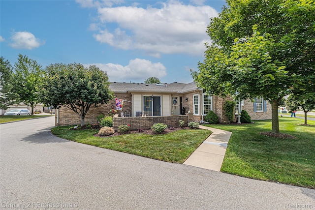 50323 Highpoint Ct, Macomb, MI 48044 - view of front facade featuring brick siding and a front lawn