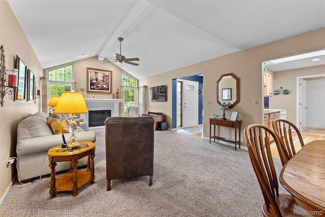 50323 Highpoint Ct, Macomb, MI 48044 - living room with a ceiling fan, a glass covered fireplace, and light colored carpet