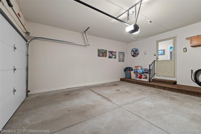 50323 Highpoint Ct, Macomb, MI 48044 - garage with a garage door opener and baseboards