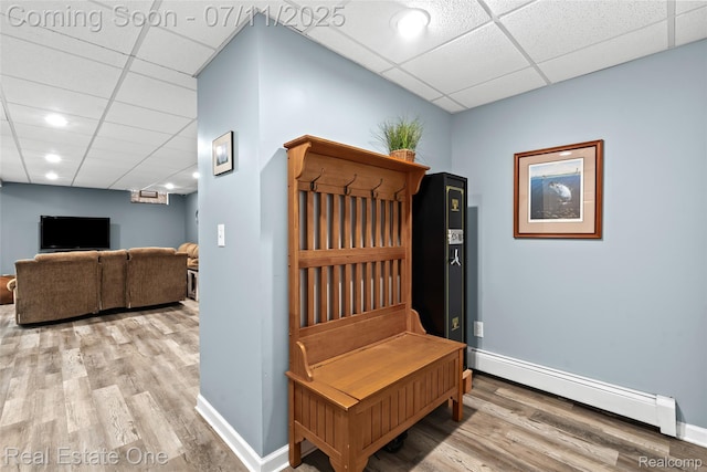 4217 Link Ave, Brighton, MI 48114 - mudroom featuring a baseboard radiator, a paneled ceiling, and wood finished floors