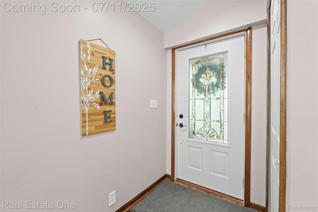 4217 Link Ave, Brighton, MI 48114 - doorway with baseboards and lofted ceiling