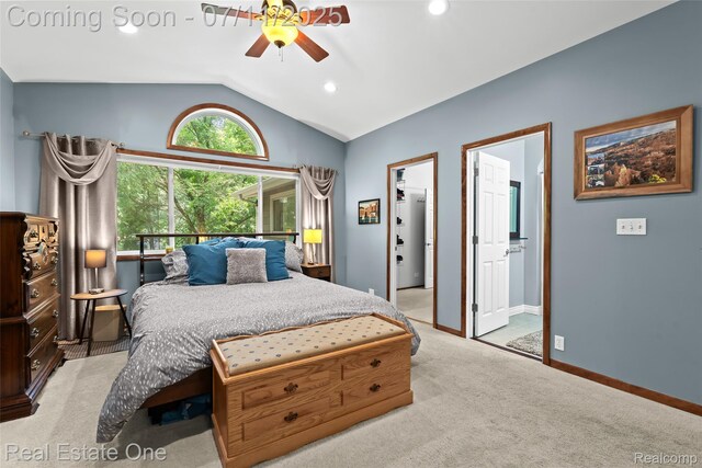 4217 Link Ave, Brighton, MI 48114 - bedroom with carpet flooring, vaulted ceiling, a spacious closet, ceiling fan, and ensuite bath