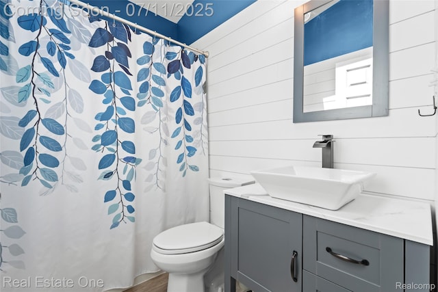 4217 Link Ave, Brighton, MI 48114 - bathroom with vanity, curtained shower, and wood walls
