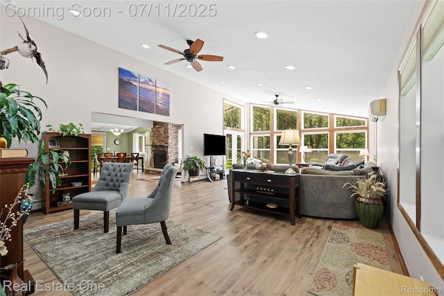 4217 Link Ave, Brighton, MI 48114 - living room featuring ceiling fan, recessed lighting, light wood-type flooring, and baseboard heating