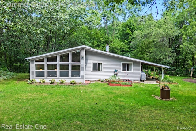 4217 Link Ave, Brighton, MI 48114 - back of property with a lawn