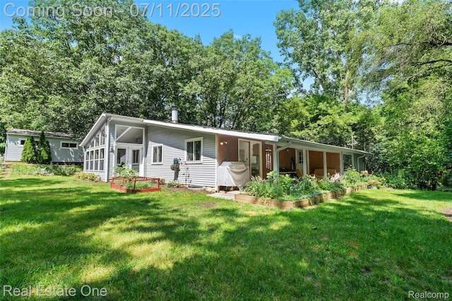4217 Link Ave, Brighton, MI 48114 - view of front of property featuring a front lawn