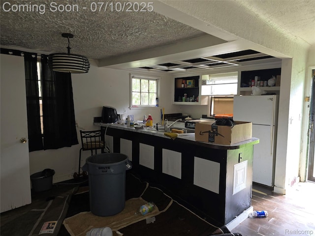 28 S Marshall St, Pontiac, MI 48342 - kitchen with freestanding refrigerator and wood finished floors