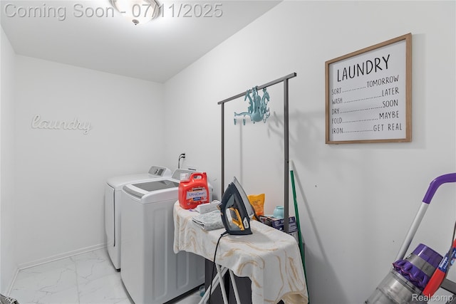 6649 Maplelawn Dr, Ypsilanti, MI 48197 - washroom with washer and dryer and marble look tile flooring