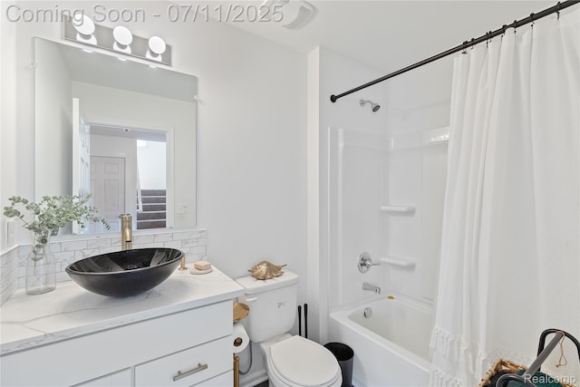 6649 Maplelawn Dr, Ypsilanti, MI 48197 - bathroom featuring vanity, shower / bath combo with shower curtain, and backsplash