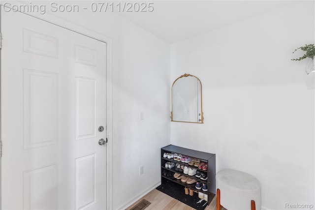 6649 Maplelawn Dr, Ypsilanti, MI 48197 - foyer with baseboards and light wood finished floors