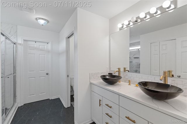 6649 Maplelawn Dr, Ypsilanti, MI 48197 - bathroom with a marble finish shower and backsplash