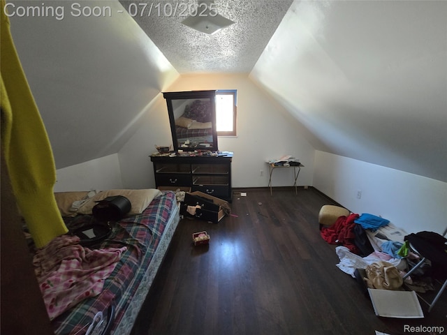 46 Michigan St, Mount Clemens, MI 48043 - bedroom featuring wood finished floors, vaulted ceiling, and a textured ceiling