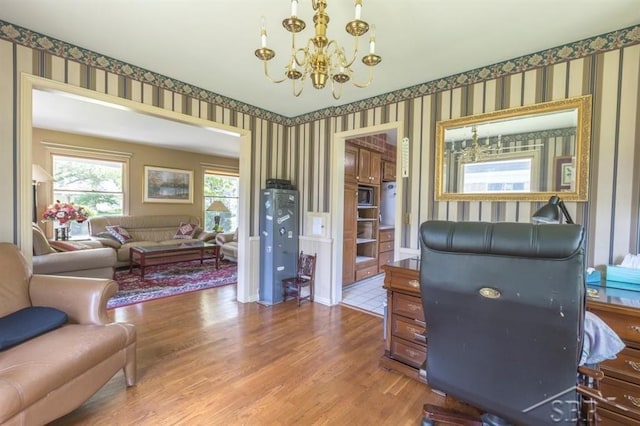 595 Stoneham Rd, Saginaw, MI 48638 - office space with wallpapered walls, a chandelier, and wood finished floors